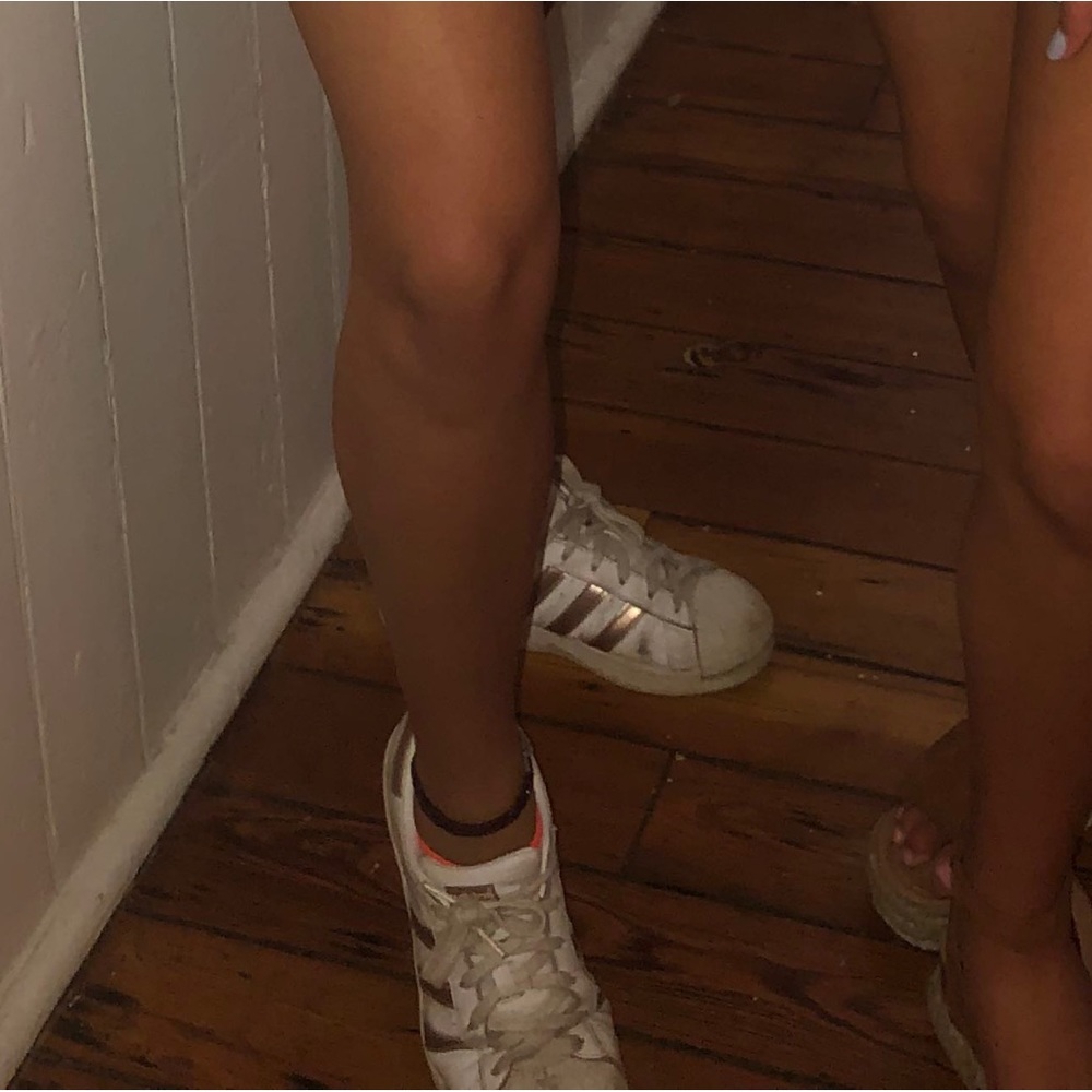 white and pink adidas superstars